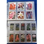 Cigarette & trade cards, two albums packed with sets, part sets & odds all relating to flowers,