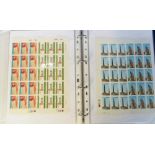 Stamps, Folder of Rhodesia/Zimbabwe collection of mint stamps in large blocks on 35 pages.