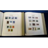 Stamps, Stanley Gibbons hingeless albums in slipcases New Zealand I, II, III, and IV together with