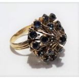 18k blue sapphire set dress cluster ring, stamped 18K, weight 7.3g approx.