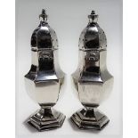 Pair of Victorian silver hexagonal section baluster pepperettes, maker W. & D., Birmingham 1900,