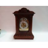 Junghans oak case three train bracket clock with strike/silent Westminster chime. The brass engraved