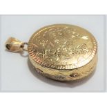 Unusual silver gilt Swiss musical pendant locket, foliate engraved, the winder stamped STE.CROIX