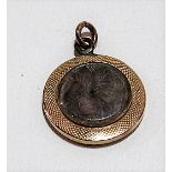 Gold engine turned circular fob with glazed hair panel, weight 2.6g approx