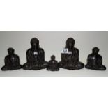 Set of five graduated Chinese bronze seated Buddha's, the two largest height 13cm, the other two 9cm