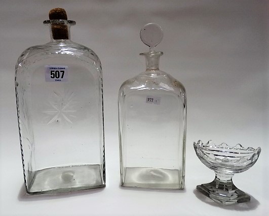 Two 19th Century square section bottles, one with facet cut decoration, the other with a stopper and