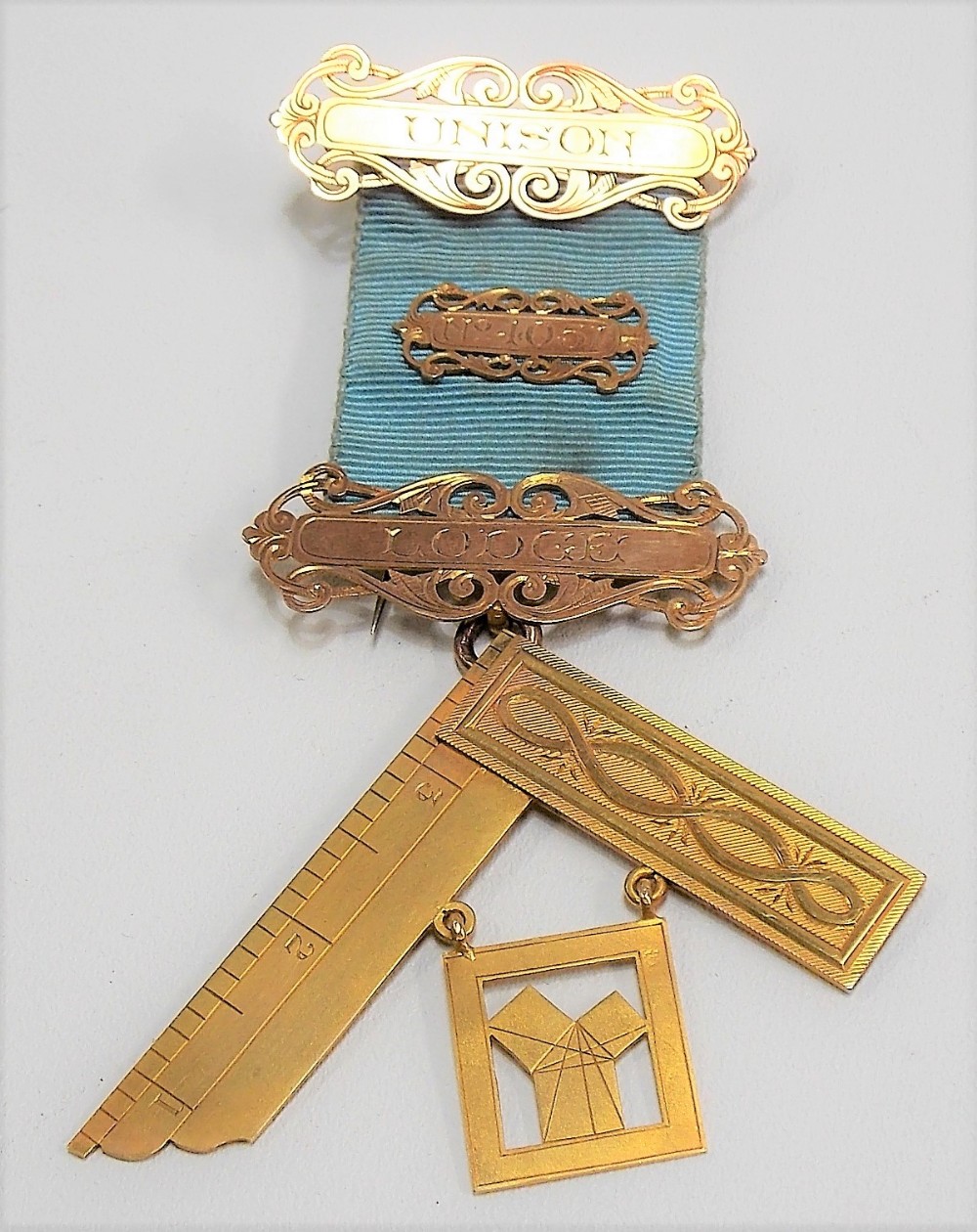 9ct gold Masonic jewel by Kensington & Son, London awarded to Brother George Berry, Unison Lodge no.