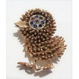 14k rose gold ruby and sapphire set Mid Century brooch modelled as a stylised chick, the white