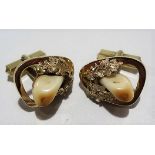 Pair of 14ct gold stag tooth set cuff links, stamped 585 and maker ELBE, weight 16.3g approx