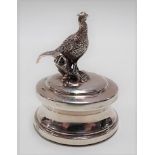 Modern silver paperweight with applied pheasant finial upon a circular base, height 54mm, Birmingham