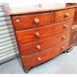 Victorian stained pine bow front chest of two short over three long graduated drawers upon turned