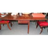 George III mahogany rectangular drop-leaf extending dining table upon four chamfered legs with brass