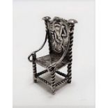 Miniature white metal embossed elbow chair, height 25mm.