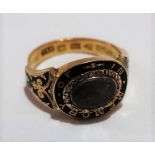 Good Victorian 18ct gold and black enamel mourning ring, set with an oval glazed hair panel and