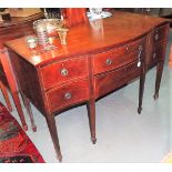 George III mahogany serpentine front sideboard, with an arrangement of five boxwood strung drawers