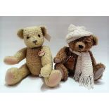 Two modern handmade mohair teddy bears, one by Robin Rive, the other by Ana Marie.