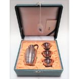 Japanese silver Sake set for three by Wako, comprising jug and three small bowls, with textured