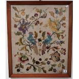 Early 20th Century crewel work panel depicting two exotic birds amongst foliage within a walnut