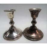Pair of continental Sterling silver weighted squat candlesticks stamped 'Preisner Sterling'