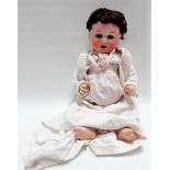 A large German bisque head doll by Porzellanfabrik Mengersgereuth, the head marked PM914. 13.,