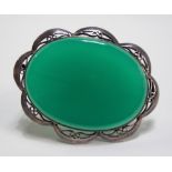 Modern silver hallmarked oval brooch with green stone or glass inset, width 60mm