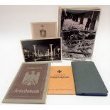 Collection of WWII press release photographs of bomb damaged buildings and aftermath, each with
