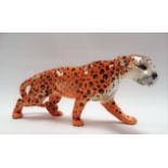 Beswick Pottery model of a leopard, length 30cm