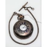 Silver key wind half hunter pocket watch, the outer case with blue enamel Roman numerals, the