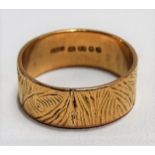 22ct hallmarked gold textured wedding band, diameter 18.25mm approx, weight 7.6g approx