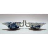 A pair of 18th Century blue & white butterboats, possibly Lowestoft, with stalk handle and lobed