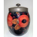 Moorcroft Pottery for Liberty & Co pomegranate pattern ovoid tobacco jar with pewter rim and lid