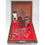 Silver and chrome marcasite set brooches, rings, pendants etc within an inlaid box