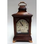 Small mahogany case bracket style clock, the silvered 3.25in arched dial signed Carter, Hart Street,