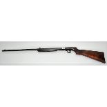 BSA .177 break barrel air rifle with walnut stock with carved mark, serial no. B4511, length 104cm