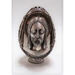 Modern Greek silver and gilt egg embossed in high relief with opposing heads of Jesus and Mary,