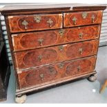 Early 18th Century walnut straight front chest of drawers, the ogee moulded top feather and cross
