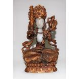 Chinese white jade gilt bronze covered seated Buddha upon lotus base, height 20cm