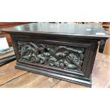 Modern rectangular small stained box, the front inset with a 16th Century carved panel, width 57cm.