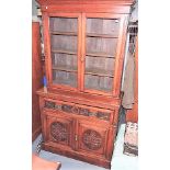 Victorian oak secretaire bookcase, the top with a pair of glazed doors enclosing shelves over the