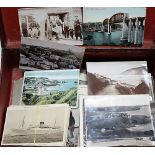 Leather travel case containing loose postcards including an memoriam Titanic card, topographical