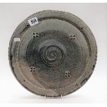 St Agnes Studio Pottery dish with blue mottled glaze and impressed marks, stamped JV.ST.AGNES,