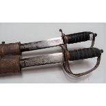 Two late 19th early 20th Century Indian Cavalry sabres with etched blades and leather covered