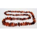 An irregular shaped amber bead necklace, weight 86.4g approx