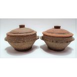 Pair of St Ives Studio Potter standard ware lidded pots with twin lug handles, diameter 13cm.