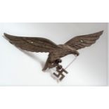 World War II Third Reich Luftwaffe, alloy metal eagle and swastika wall plaque with three screw