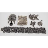 Collection of silver jewellery including a Mid Century silver pierced bracelet, abstract brooch,