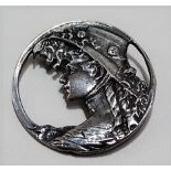 Early 20th Century silver Art Nouveau cast and pierced circular brooch cast with a profile head of a