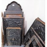 18th Century Continental cast iron stove cast with foliate scrolls to the plates and monogrammed FOV