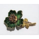 High purity gold green enamel and ruby set articulated flower brooch, the leaves open and close to