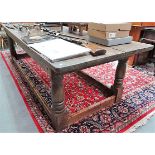Large reclaimed pine refectory style table, the five plank top over turned supports united by